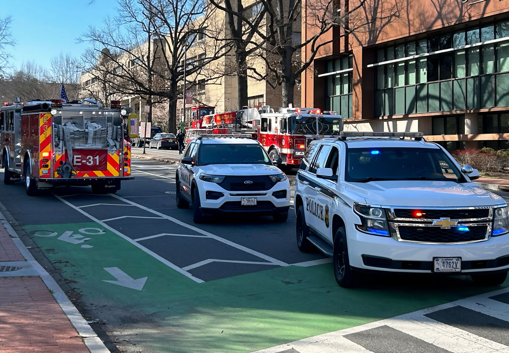 U.S. Secret Service vehicles block access to a street leading to the Embassy of Israel in Washington, DC on Feb. 25, 2024. A man reportedly set  himself on fire near the embassy on Sunday afternoon.